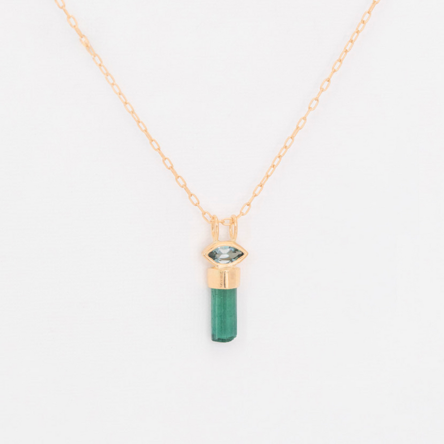 Natural 'Pencil' teal tourmaline set in 14k gold, with a green marquise tourmaline set above it, on a delicate 18