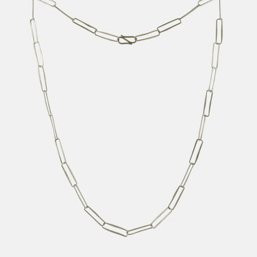 Hand-hammered wire rectangles linked together make up this lightweight delicate chain.