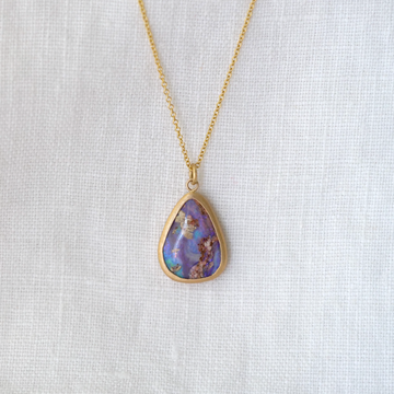 One of a kind, large Australian Opal bezel set in 18k yellow gold. On an 18inch, 18k yellow gold chain.