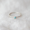 3 of 6: Sterling Silver bezel band set with a gorgeous 2.5mm turquoise