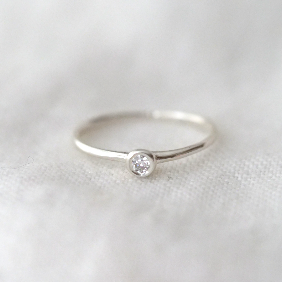 Sterling Silver bezel band set with a gorgeous 2.5mm white diamond