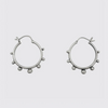 Medium hoop with graduated granulated balls along the edge and a hinge closure 