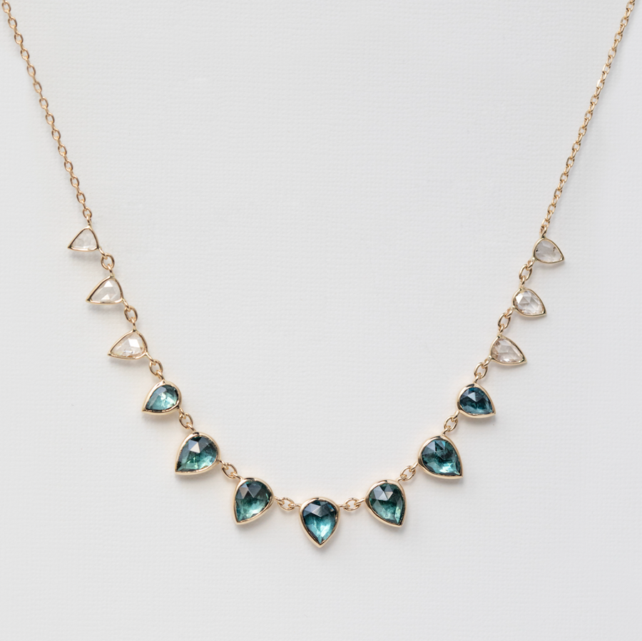 14k yellow gold, with gradation multi Tourmaline and rose cut diamonds.