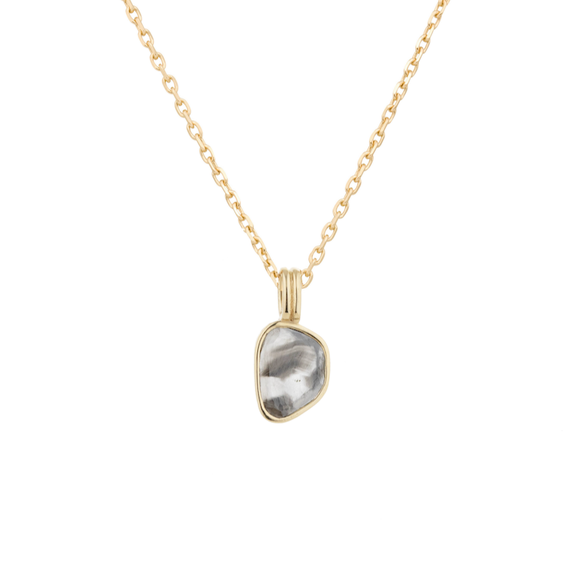 grey diamond on 14k gold chain on white background