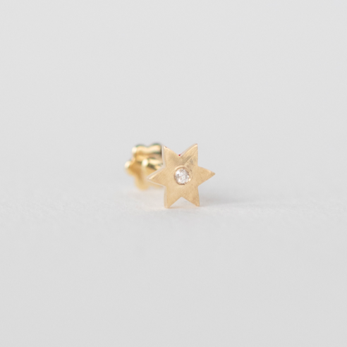 gold star with white diamond in the center
