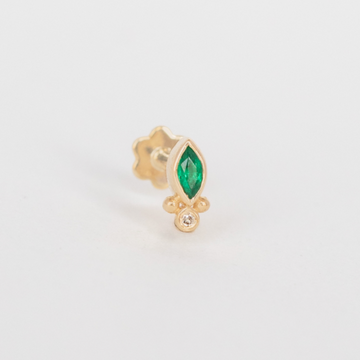 marquise shape emerald in 14k gold with small granulation and diamond at the bottom