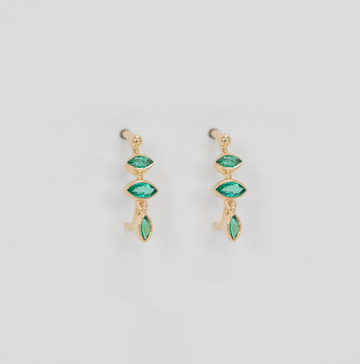 YELLOW GOLD EMERALDS MARQUISE WITH ONE DANGLING EMERALD MARQUISE EARRINGS.