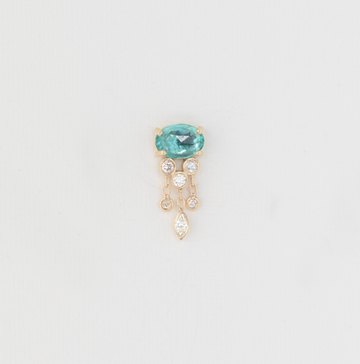 Celine Daoust 14k light yellow gold single jellyfish earring with one emerald & dangling diamonds below it.