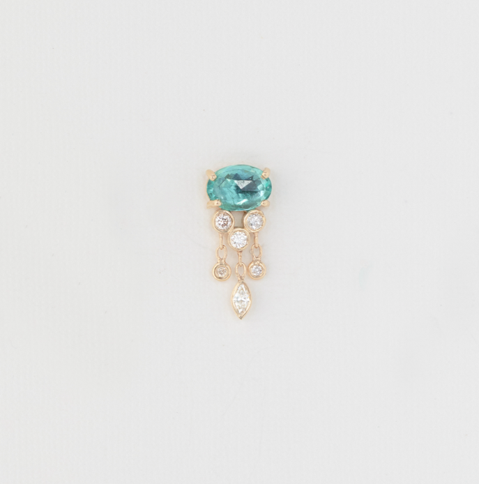 Celine Daoust 14k light yellow gold single jellyfish earring with one emerald & dangling diamonds below it.