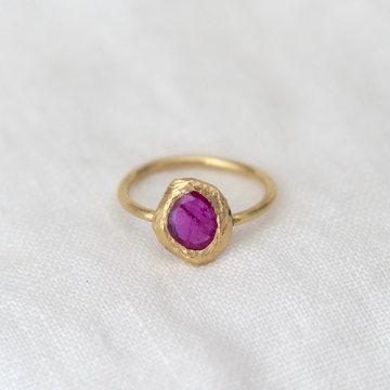 extra large and vibrantly hued rose cut ruby set in our hand carved 18 karat gold setting