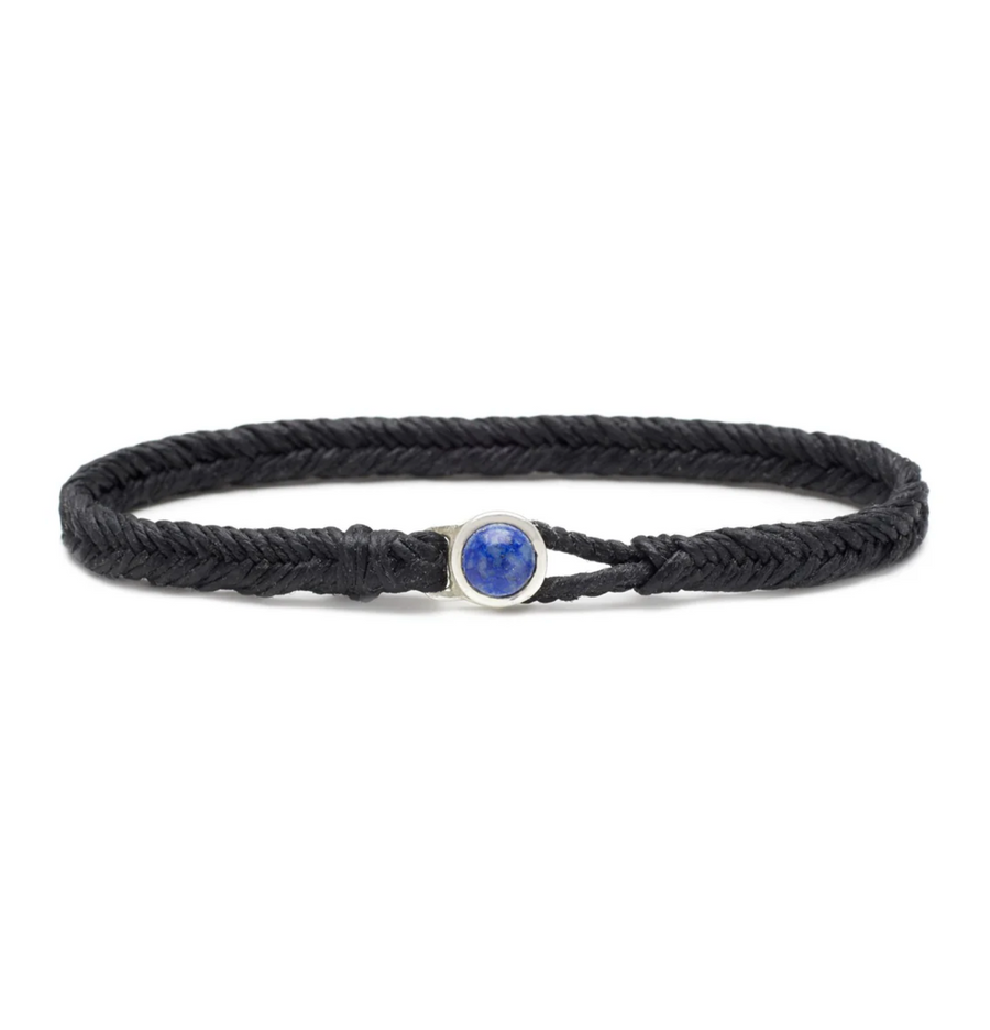 nylon cord lightly coated with wax Featuring a sterling silver button clasp with natural lapis lazuli cabochon