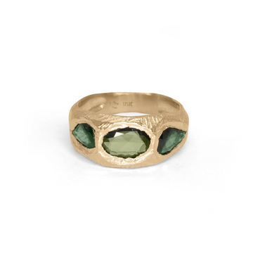 18 karat gold hand carved ring with 3 vibrant freeform rose cut green sapphires