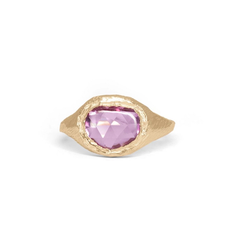 pink sapphire set in hand carved and cast in 18 karat yellow gold
