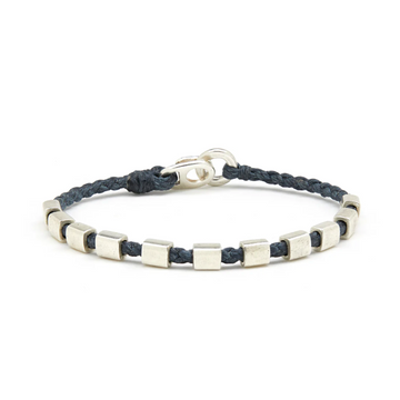 woven nylon with 11 silver bead charms and a silver clasp