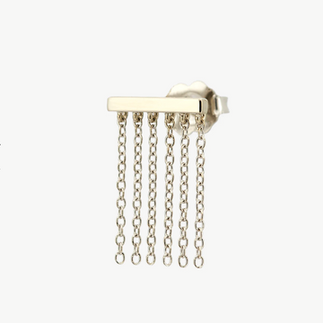 Gold earring with dangling chains on a white background