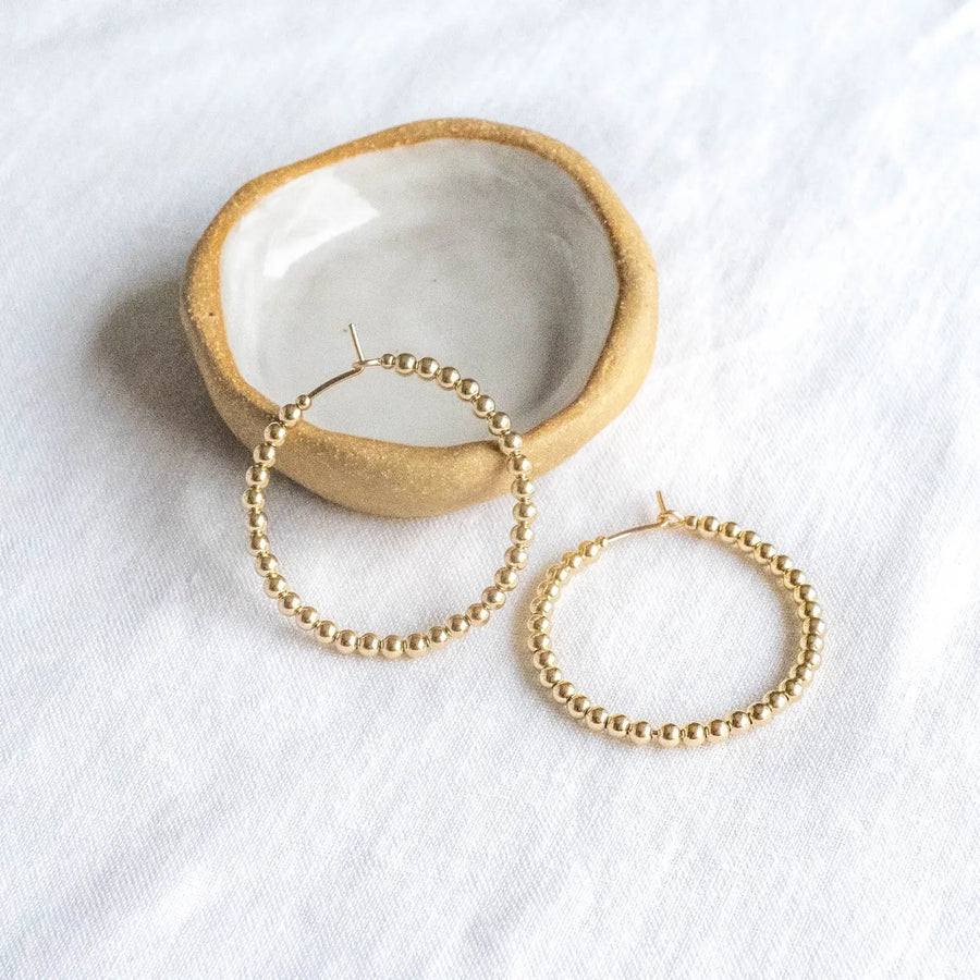 A continuous circle of 3mm 14k gold filled beads