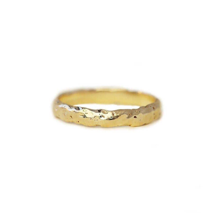 wide gold band with a lot of texture