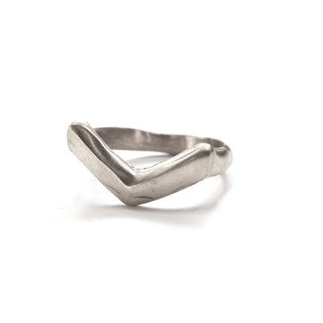 Silver ring with a V-shaped design on a white background