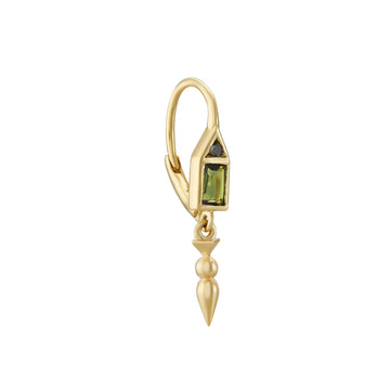 Gold earring with green gemstone on a white background