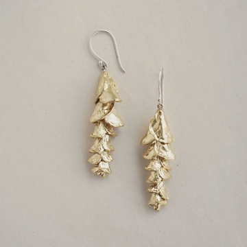 Sterling silver hook ear wire with multilayered brass petals teared in a cone shape