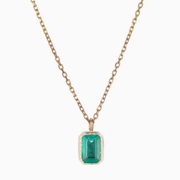 Jennie Kwon Designs emerald cut emerald set in 14k gold pendant