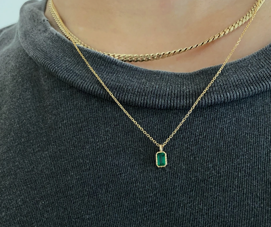 Jennie Kwon Designs emerald cut emerald set in 14k gold pendant