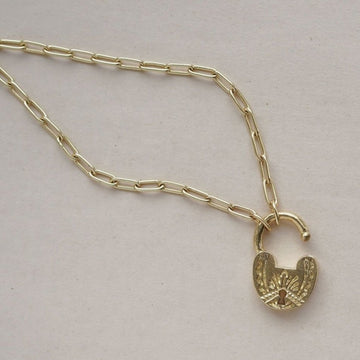 Brass lock pendant that opens to act as closure for this brass paperclip chain